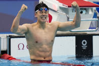 Shun Wang, of China, celebrates after winning the gold medal in the men's 200-meter individual medley final at the 2020 Summer Olympics, Friday, July 30, 2021, in Tokyo, Japan. (AP Photo/Jae C. Hong)