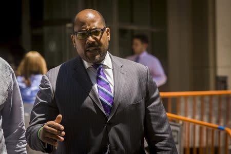 New York State Senator John Sampson departs the Brooklyn Federal Courthouse in the Brooklyn borough of New York, June 22, 2015. REUTERS/Lucas Jackson