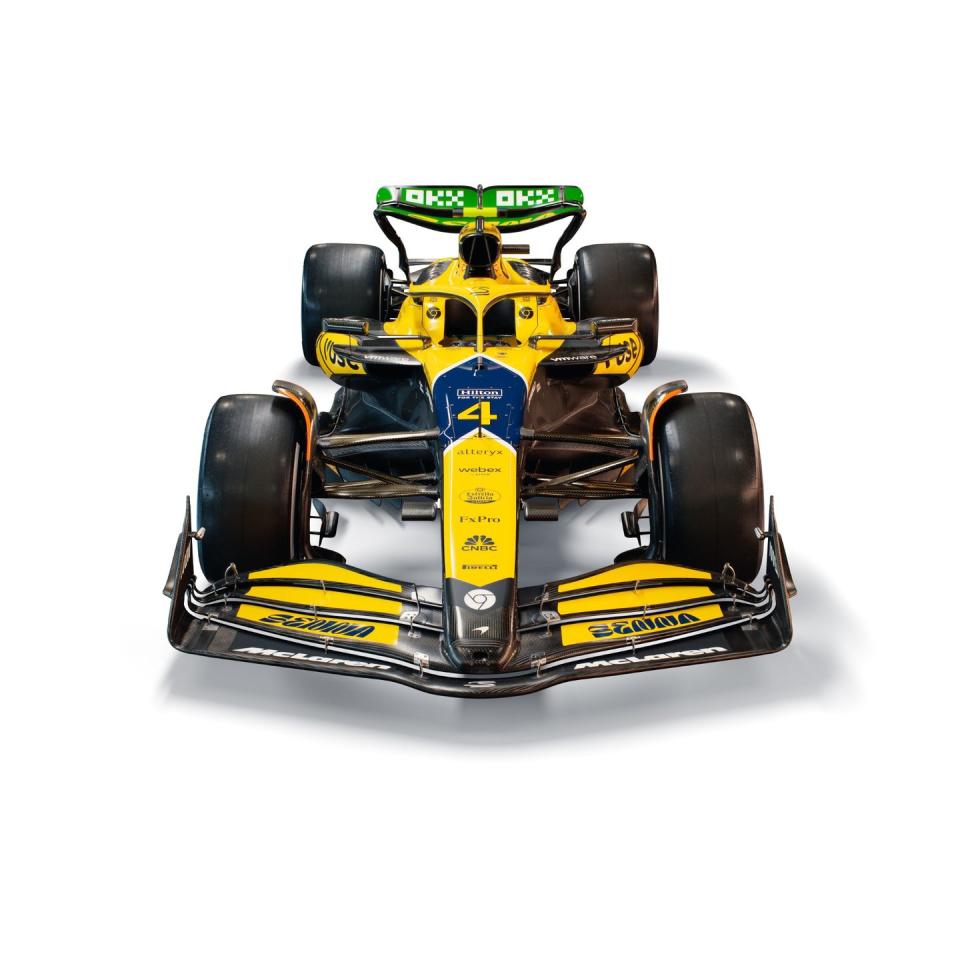 a yellow and black race car