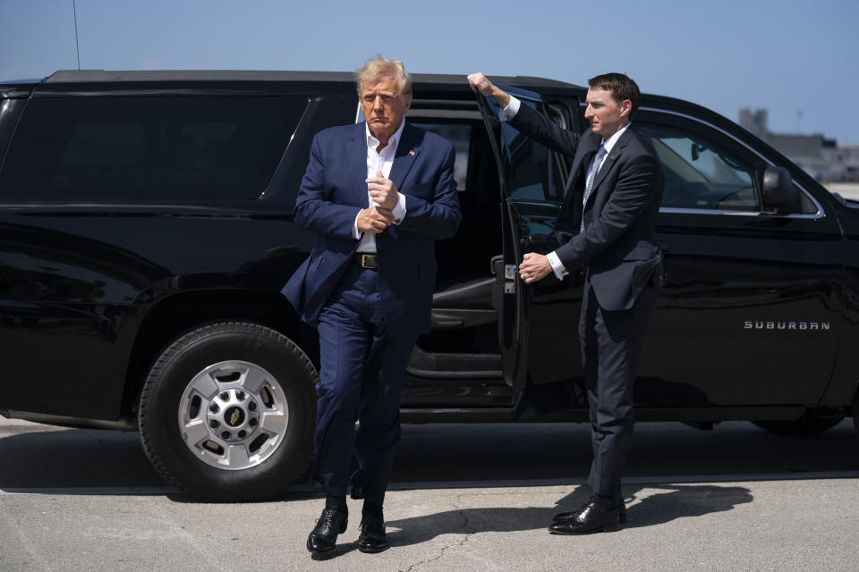 FILE - Former President Donald Trump arrives to board his airplane for a trip to a campaign rally in Waco, Texas, at West Palm Beach International Airport, Saturday, March 25, 2023, in West Palm Beach, Fla. (AP Photo/Evan Vucci, File)