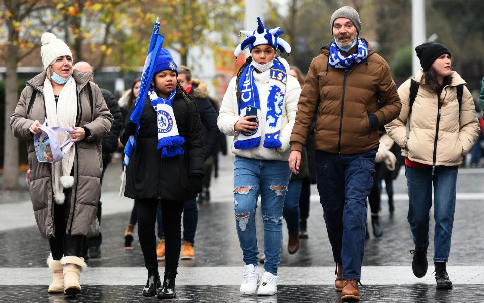 Fans of Chelsea make their way towards the stadium ahead of the Vitality Women's FA Cup Final between Arsenal FC and Chelsea FC at Wembley Stadium on December 05, 2021 in London - GETTY IMAGES