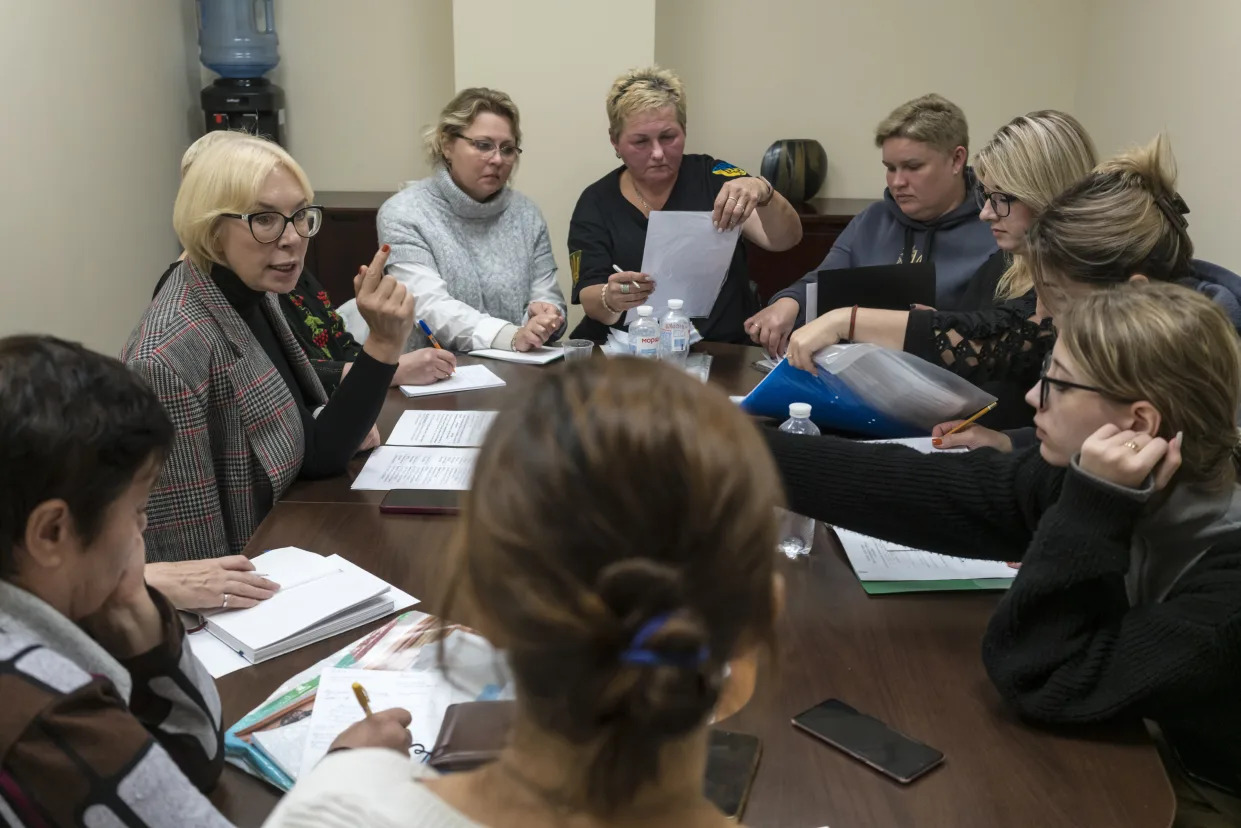 Family members of Ukrainian soldiers who are prisoners of war meet with Lyudmila Denisova, left, the country’s former human rights ombudsman, in Kyiv, Ukraine, Oct. 16, 2023. (Brendan Hoffman/The New York Times)