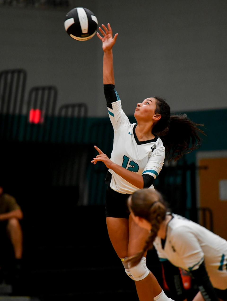 Amanda Jimenez serves for Bayside during their volleyball match against Heritage Wednesday, Sept. 7, 2022. Craig Bailey/FLORIDA TODAY via USA TODAY NETWORK