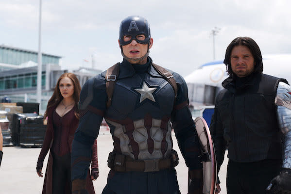 Elizabeth Olsen, Chris Evans, and Sebastian Stan looking ready for a fight.