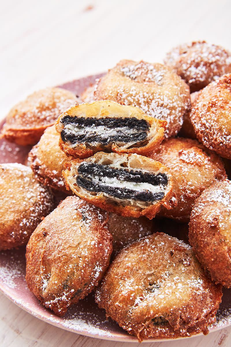 <p>Make these deep-fried Oreos at home, they're worth every single calorie (trust us). These are the perfect treats for any occasion! </p><p>Get the <a href="https://www.delish.com/uk/cooking/recipes/a32360205/best-deep-fried-oreos-recipe/" rel="nofollow noopener" target="_blank" data-ylk="slk:Deep Fried Oreos;elm:context_link;itc:0;sec:content-canvas" class="link ">Deep Fried Oreos</a> recipe.</p>