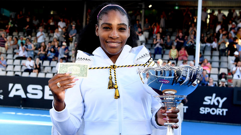 Serena Williams, pictured here celebrating with the trophy after winning the ASB Classic.