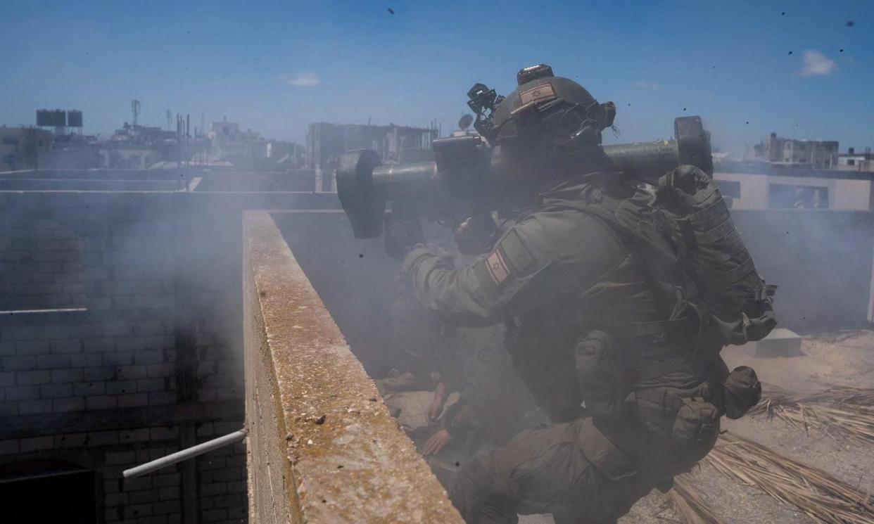 <span>An IDF soldier during Israeli operations in eastern Rafah. About 800,000 Palestinians have fled the city.</span><span>Photograph: Xinhua/Rex/Shutterstock</span>