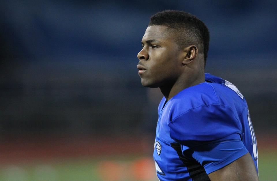 Khalil Mack walks off the field after a game between Buffalo and Pittsburgh in October 2012.