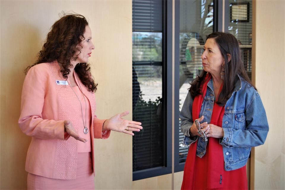 San Juan College President Toni Hopper Pendergrass, left, and U.S. Rep. Teresa Leger Fernandez talk about the impact the COVID-19 pandemic had on the school during a visit to the college's Health and Human Performance Center in Farmington on May 5.