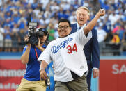 <p>Los Angeles Dodgers former pitcher Fernando Valenzuela throws out the ceremonial first pitch as broadcaster Vin Scully looks on before game two of the 2017 World Series against the Houston Astros at Dodger Stadium. Mandatory Credit: Jayne Kamin-Oncea-USA TODAY Sports </p>