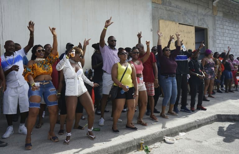 Revellers dance during the World Music Creole Festival, which came one year after Hurricane Maria ravaged the island