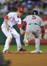 PHILADELPHIA, PA - OCTOBER 02: Albert Pujols #5 of the St. Louis Cardinals is tagged out by Chase Utley #26 of the Philadelphia Phillies in the ninth inning of Game Two of the National League Division Series at Citizens Bank Park on October 2, 2011 in Philadelphia, Pennsylvania. (Photo by Drew Hallowell/Getty Images)