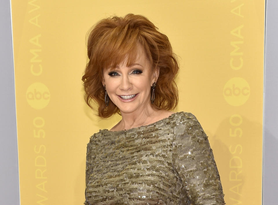 FILE - This Nov. 2, 2016 file photo shows Reba McEntire at the 50th annual CMA Awards in Nashville, Tenn. McEntire is releasing “Sing it Now: Songs of Faith & Hope” on Feb. 3, a double album of inspirational and gospel music. She said the timing was right for her to focus on her faith after she and Narvel Blackstock announced in 2015 they were divorcing after 26 years of marriage. (Photo by Evan Agostini/Invision/AP, File)