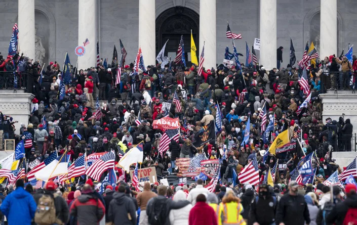 Trump supporters take over the steps of the Capitol on Wednesday, Jan. 6, 2021, as the Congress works to certify the electoral college votes. (Bill Clark/CQ-Roll Call, Inc via Getty Images)