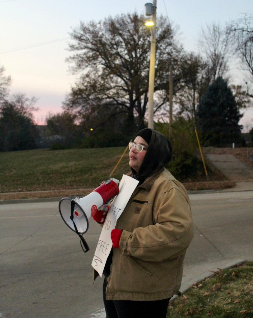 Moe Mills, a shift supervisor at Starbucks’ Hanley & Dale store in St. Louis, Missouri, joins colleagues on strike on the annual Red Cup Day in 2022.