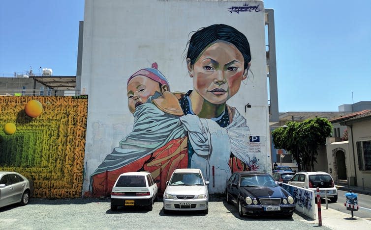 <span class="caption">A Nepali mother and child. Mural by local street artist Paparazzi.</span> <span class="attribution"><span class="source">Billy Tusker Haworth.</span>, <span class="license">Author provided</span></span>