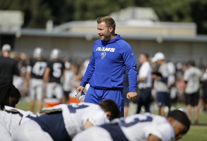 Rams head coach Sean McVay watches players stretch during a joint practice with the Raiders in 2019.