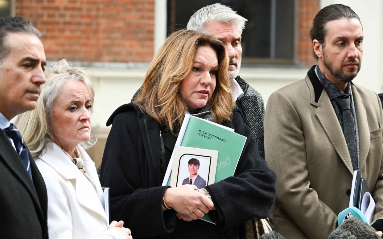 David and Emma Webber (mid) parents of Daniel Webber who was one of three people stabbed to death in Nottingham by Valdo Calocane holding a press conferance outside CPS office