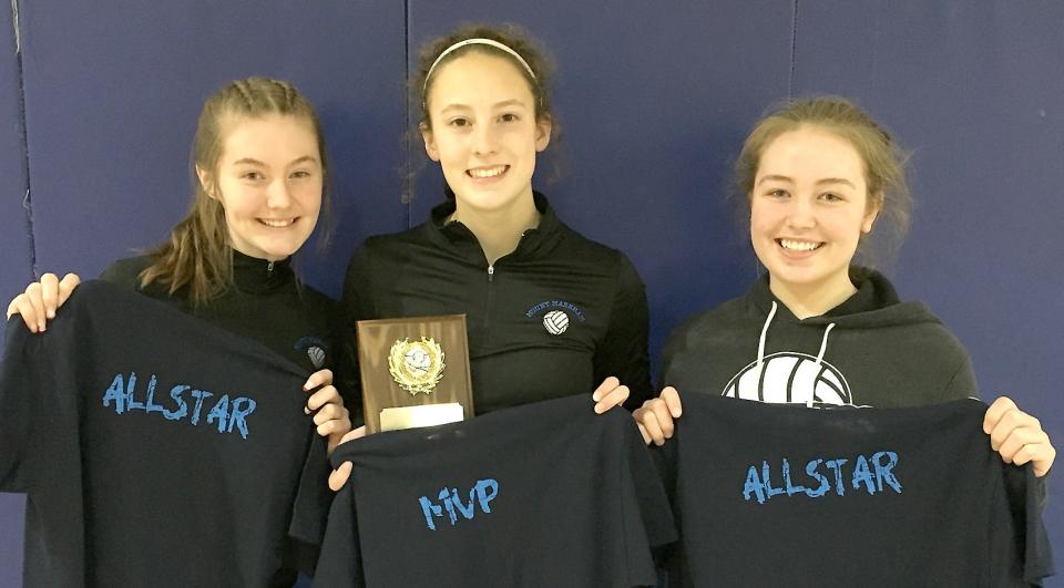 Finale Tournament Most Valuable Player Lauren Jones (center) of Mt. Markham is flanked Saturday by Mustang teammates and tournament all-stars Chloe Poland and Abbie Ainslie.