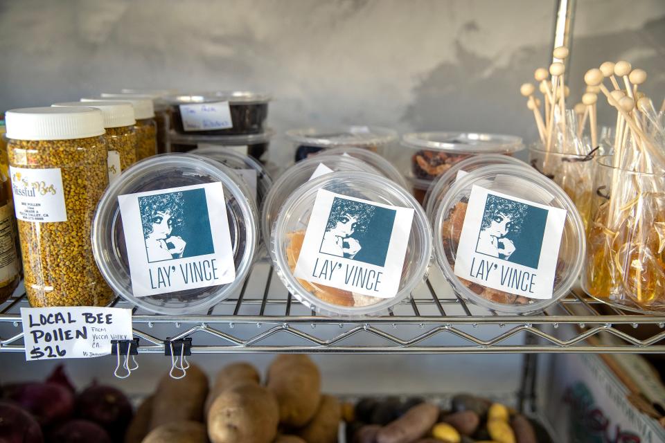 Lay' Vince sells takeaway items such as dried fruit and local bee pollen.