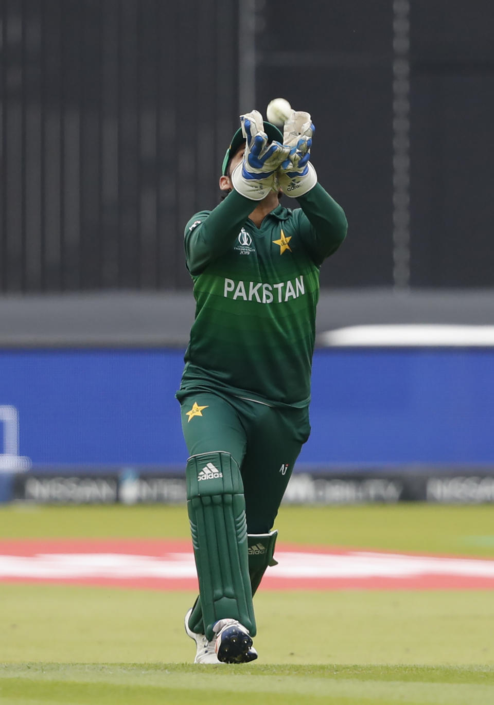 Pakistan's captain Sarfaraz Ahmed takes a catch to dismiss South Africa's captain Faf du Plessis during their Cricket World Cup match between Pakistan and South Africa at Lord's cricket ground in London, Sunday, June 23, 2019. (AP Photo/Alastair Grant)