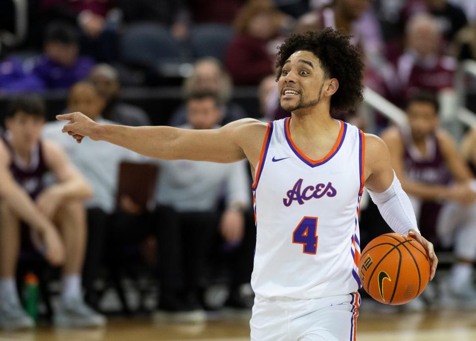 Evansville’s Marvin Coleman II (4) calls a play as the University of Evansville Purple Aces play the Southern Illinois Salukis at Ford Center in Evansville, Ind., Wednesday, Nov. 30, 2022. 