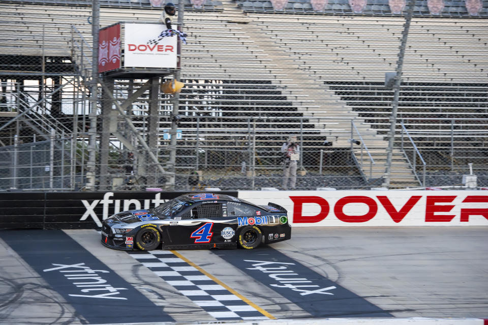 Kevin Harvick (4) wins a NASCAR Cup Series auto race at Dover International Speedway, Sunday, Aug. 23, 2020, in Dover, Del. (AP Photo/Jason Minto)