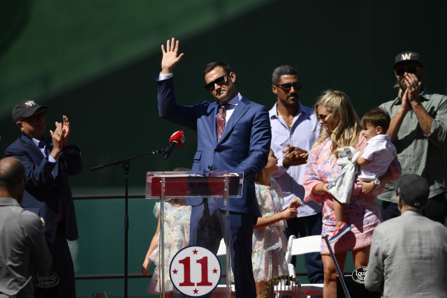 Keith Zimmerman, father of former Washington Nationals baseball player Ryan  Zimmerman, holds up Ryan's jersey at a jersey retirement ceremony before a  baseball game between the Nationals and the Philadelphia Phillies, Saturday