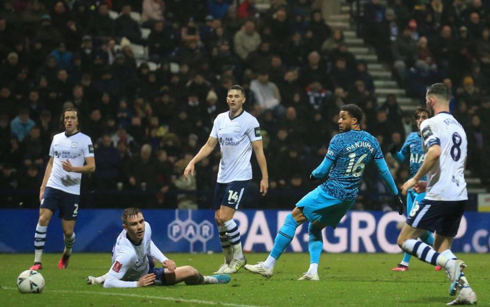 Tottenham Hotspur's Dutch midfielder Arnaut Danjuma scores their third goal - LINDSEY PARNABY/AFP via Getty Images