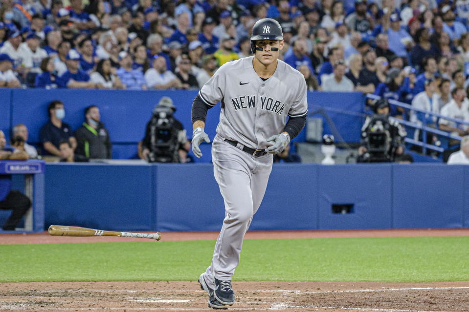 New York Yankees' Anthony Rizzo heads to first after hitting a grand slam against the Toronto Blue Jays during the fifth inning of a baseball game Friday, June 17, 2022, in Toronto. (Christopher Katsarov/The Canadian Press via AP)