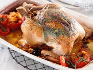 A french roasted chicken with stuffed tomatoes is a great dish for a family meal. View recipe