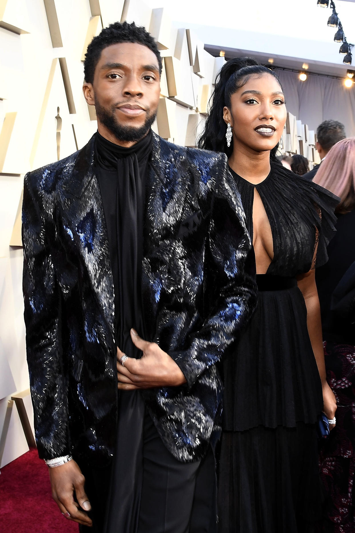 chadwick boseman and wife in black evening attair