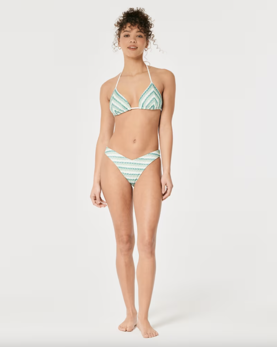 <p><a href="https://go.redirectingat.com?id=74968X1596630&url=https%3A%2F%2Fwww.hollisterco.com%2Fshop%2Fus%2Fp%2Fcrochet-triangle-bikini-top-52490322%3Fseq%3D02%26scid%3Dscplp654405963%26sc_intid%3D654405963%26cmp%3DPLA%253AEVG%253A20%253AHCo%253AD%253AUSCA%253AX%253AGGL%253AX%253ASHOP%253AX%253AX%253AX%253AX%253Ax%253AHCO_Google_Shopping_PLA_US_Swimwear_All%2BProducts_PRODUCT_GROUP%26gclid%3DCjwKCAjwhJukBhBPEiwAniIcNTGRE-7SnMIu-DsPysd_KIjZTAFYQr-lvASEp-_I6azTdwvpt3joLBoCXz0QAvD_BwE%26gclsrc%3Daw.ds&sref=https%3A%2F%2Fwww.cosmopolitan.com%2Fstyle-beauty%2Ffashion%2Fg44173005%2Fcrochet-clothing%2F" rel="nofollow noopener" target="_blank" data-ylk="slk:Shop Now;elm:context_link;itc:0;sec:content-canvas" class="link ">Shop Now</a></p><p>Crochet Triangle Bikini Top</p><p>$34.95</p><p>hollisterco.com</p><span class="copyright">Hollister Co.</span>