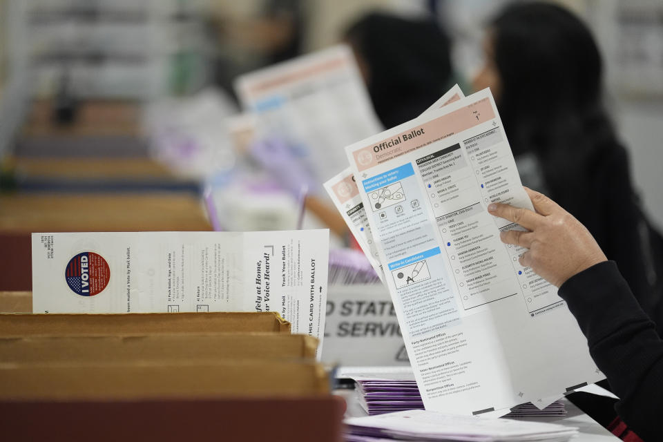 Ballots are inspected at a ballot processing center Tuesday, March 5, 2024, in the City of Industry, Calif. (AP Photo/Marcio Jose Sanchez)