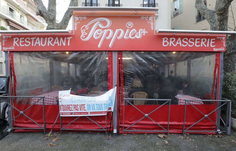 A restaurant in the French Riviera city of Nice opens for lunch in defiance of nationwide COVID-19 rules