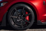 <p>The 20-inch wheels were necessitated by the standard two-piece iron-and-aluminum brake rotors. Measuring 16.5 inches, the front rotors are grabbed by six-piston Brembo calipers. The rears are 14.6 inches in diameter and carry four-piston calipers.</p>