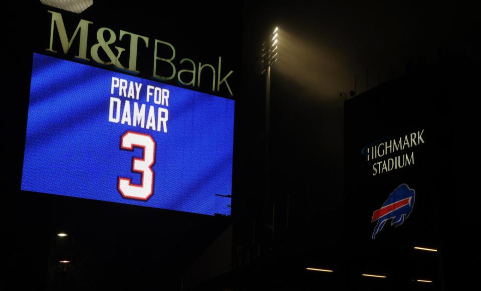 Buffalo Bills fans attend a candlelight prayer vigil for player Damar Hamlin at Highmark Stadium on January 3, 2023 in Orchard Park, New York. Hamlin collapsed after making a tackle last night on Monday Night Football.