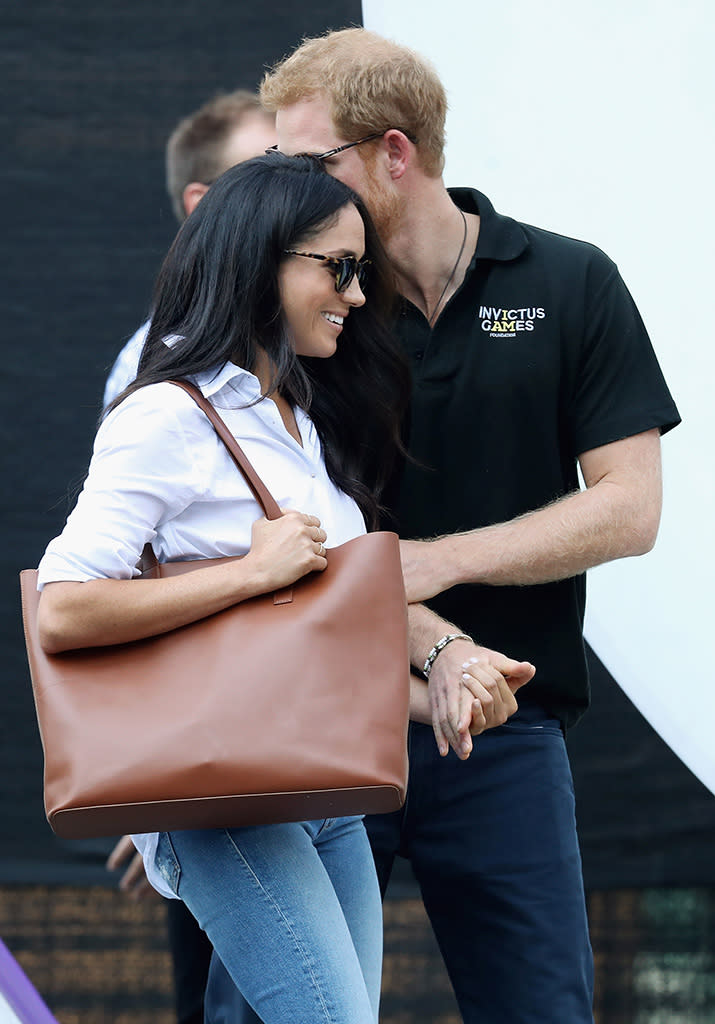 TORONTO, ON – SEPTEMBER 25: Prince Harry (R) and Meghan Markle (L) attend a Wheelchair Tennis match during the Invictus Games 2017 at Nathan Philips Square on September 25, 2017 in Toronto, Canada (Photo: Chris Jackson/Getty Images for the Invictus Games Foundation )