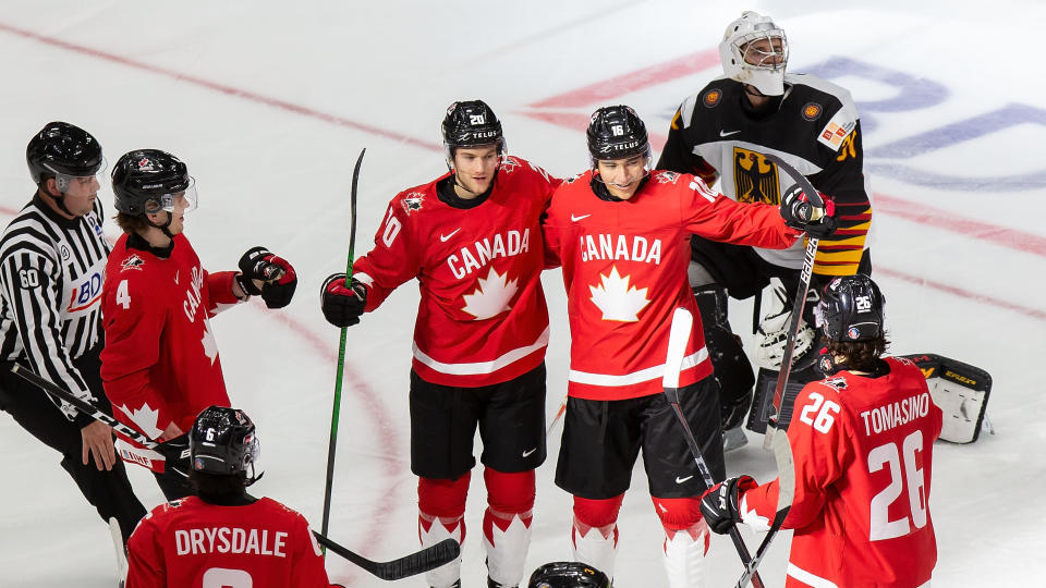 EDMONTON, AB - DECEMBER 26: Bowen Byram #4, Dawson Mercer #20, Ryan Suzuki #16 and Philip Tomasino #26 of Canada celebrate a goal against goaltender Jonas Gahr #30 of Germany during the 2021 IIHF World Junior Championship at Rogers Place on December 26, 2020 in Edmonton, Canada. (Photo by Codie McLachlan/Getty Images)