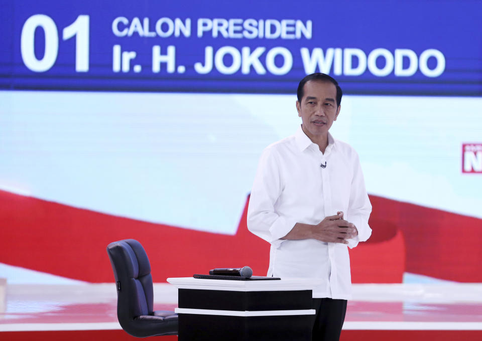 Indonesian presidential candidate Joko Widodo delivers his speech during a televised debate in Jakarta, Indonesia, Sunday, Feb. 17, 2019. Indonesia is gearing up to hold its presidential election on April 17 that will pit in the incumbent against the former general. (AP Photo / Achmad Ibrahim)