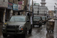 Pakistani soldiers patrol outside a mosque in Rawalpindi, Pakistan, Friday, March 27, 2020. Authorities imposed nation-wide lockdown appealed people to avoid public gatherings like Friday congregations and offer their prayers at home as a preventive measures to contain the spread of coronavirus. The virus causes mild or moderate symptoms for most people, but for some, especially older adults and people with existing health problems, it can cause more severe illness or death. (AP Photo/B.K. Bangash)