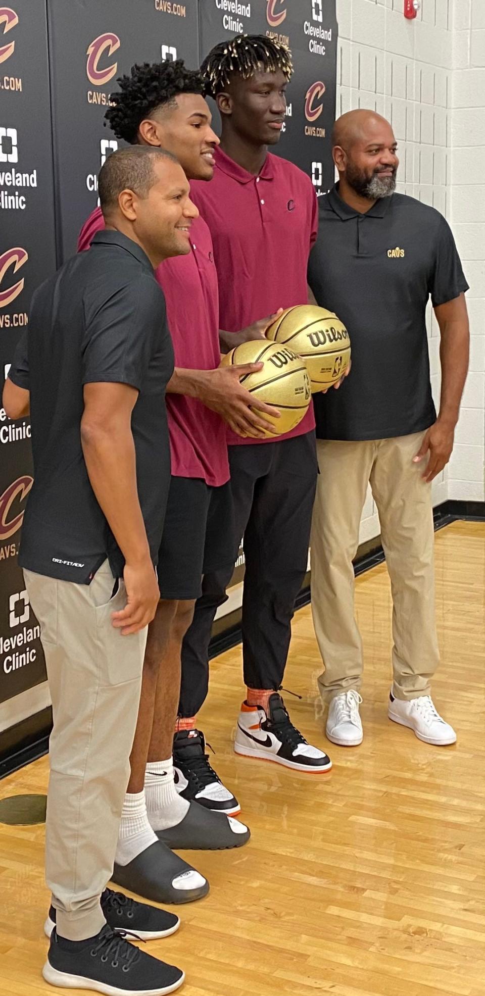 Cavaliers draft picks Ochai Agbaji (second from left) and Khalifa Diop with President of Basketball Operations Koby Altman (left) and coach J.B. Bickerstaff (far right). The two players were introduced on Friday, June 24, 2022 at Cleveland Clinic Courts in Independence, Ohio. Photo: Marla Ridenour, Akron Beacon Journal