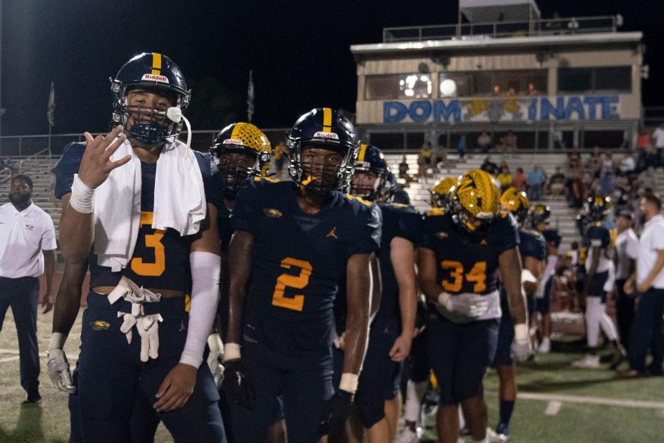 Naples' Devin Moore (3) poses for a portrait after defeating South Fort Myers 51-19 in the de facto Florida 6A District 14 championship, Friday, Oct. 22, 2021, at Naples High School in Naples, Fla.Naples defeated South Fort Myers 51-19.