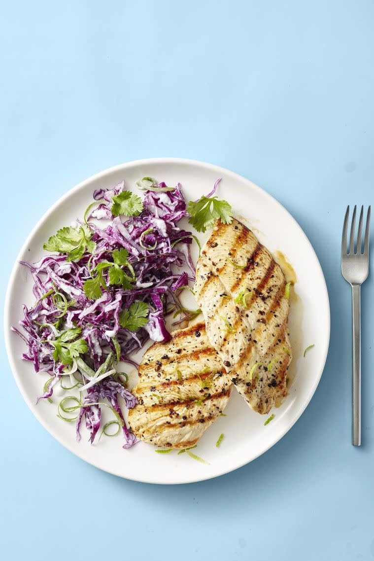 <p>You'd be hard pressed to find a dinner under 250 calories that eats this hearty and is this filling. The best part? It's ready in 20.</p><p>Get the <a href="https://www.goodhousekeeping.com/food-recipes/a28470056/grilled-chicken-with-coconut-lime-slaw-recipe/" rel="nofollow noopener" target="_blank" data-ylk="slk:Grilled Chicken With Coconut-Lime Slaw recipe" class="link "><strong>Grilled Chicken With Coconut-Lime Slaw recipe</strong></a><em>.</em></p>