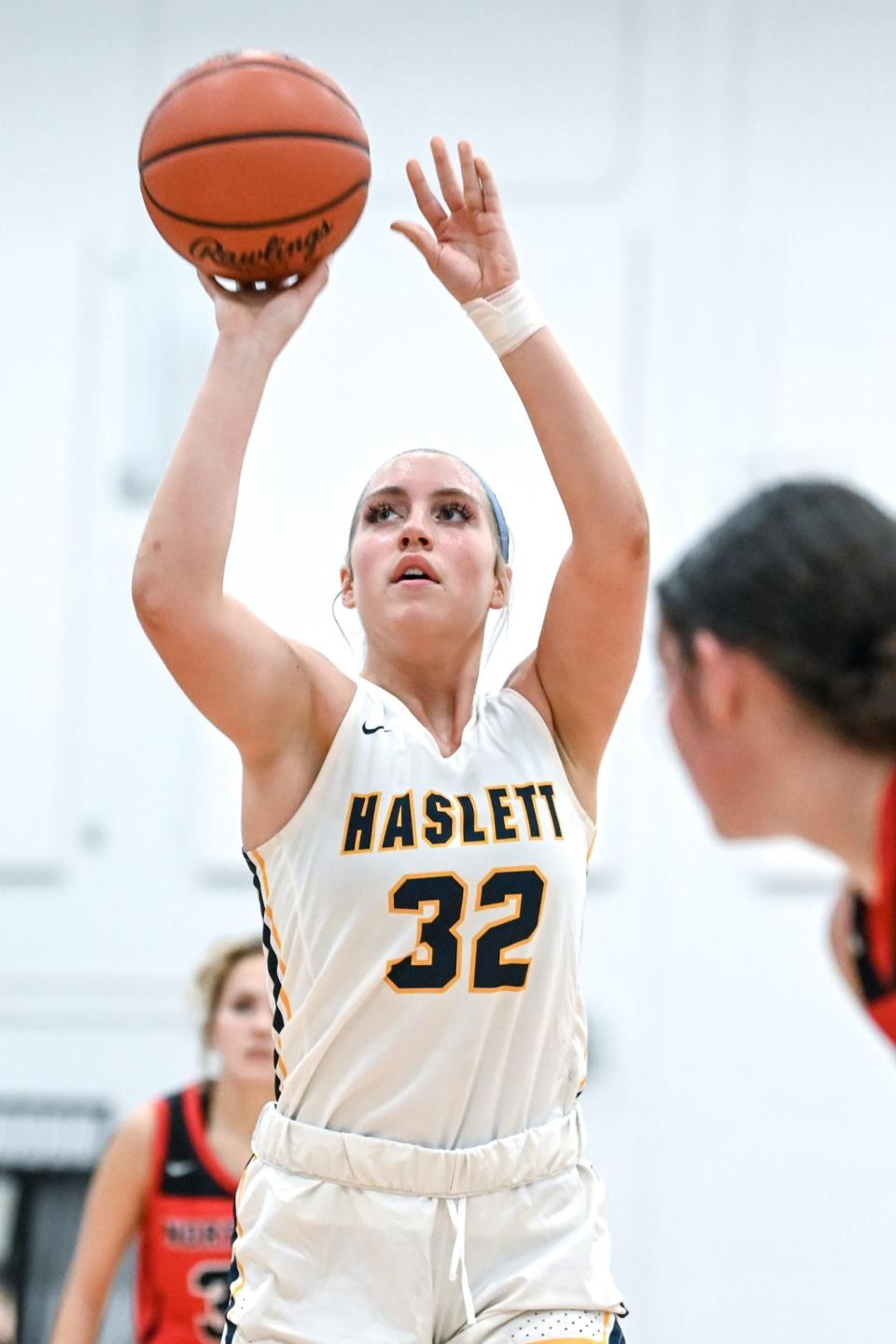 Haslett's Grace Isenhath makes a free throw against Jackson Northwest during the fourth quarter on Tuesday, Nov. 29, 2022, at Haslett High School.