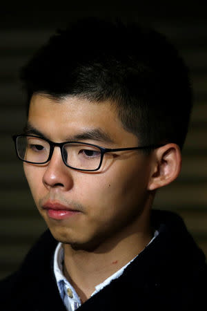 Former student leader Joshua Wong reacts after being released on bail at the High Court in Hong Kong, China January 23, 2018. REUTERS/Bobby Yip