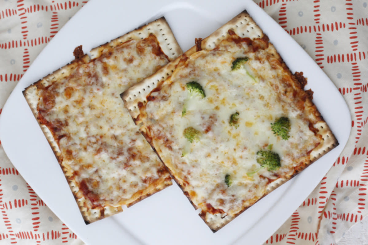 <p>Weelicious</p><p>No pizza dough, no problem. Turn your matzo into a flatbread-like pizza.</p><p><strong>Get the recipe: <a href="https://weelicious.com/matzah-pizzas-recipe/" rel="nofollow noopener" target="_blank" data-ylk="slk:Matzo Pizzas;elm:context_link;itc:0;sec:content-canvas" class="link rapid-noclick-resp">Matzo Pizzas</a></strong></p>