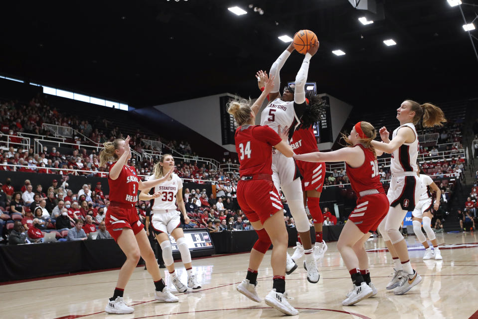 Stanford forward Francesca Belibi (5) shoots against Sacred Heart center Kelsey Wood (34) during the first half of a first-round college basketball game in the women's NCAA Tournament in Stanford, Calif., Friday, March 17, 2023. (AP Photo/Josie Lepe)