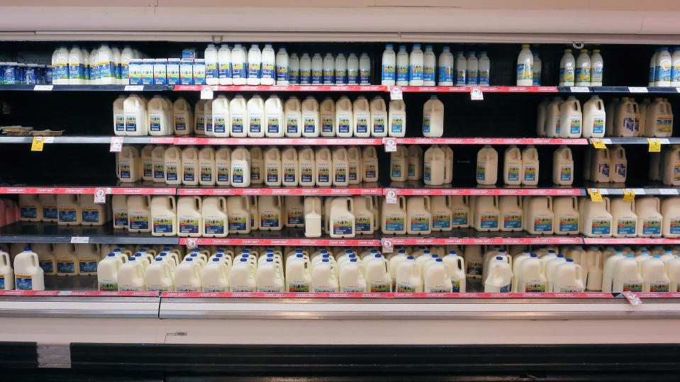 Fridges stocked with milk are seen in a Coles supermarket on May 24, 2016 in Sydney, Australia.