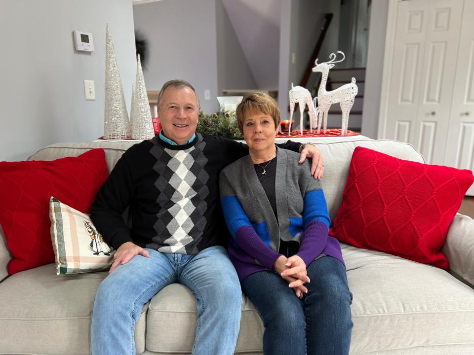 Dave Handwerk and his wife, Nancy, relax at home during the holidays. Handwerk did not seek reelection to the mayor's seat in Orrville this year. he plans to step back from community service and resume doing some of his favorite activities like painting, mowing or working out. But most of all, he says, he wants to spend quality time with his five grandchildren.